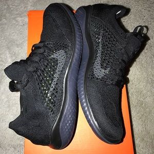 Nike women’s free RN flynit triple black size 9